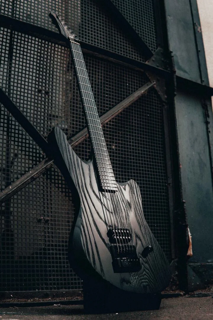 HAPAS Ashen Buster Odeholm Signature Guitar on a Stand