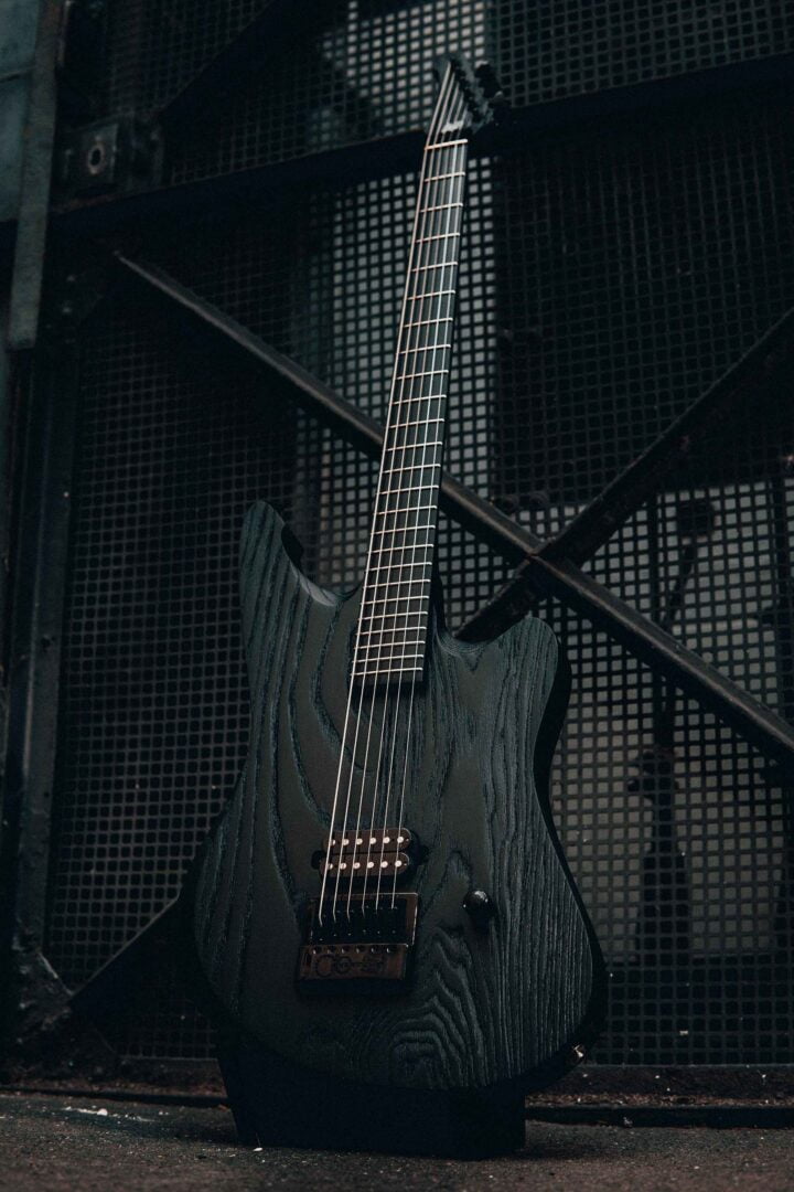 HAPAS Ashen Buster Odeholm Signature Guitar on a Stand