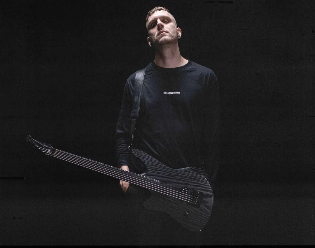 Buster Odeholm with a HAPAS Ashen guitar hanging from his neck